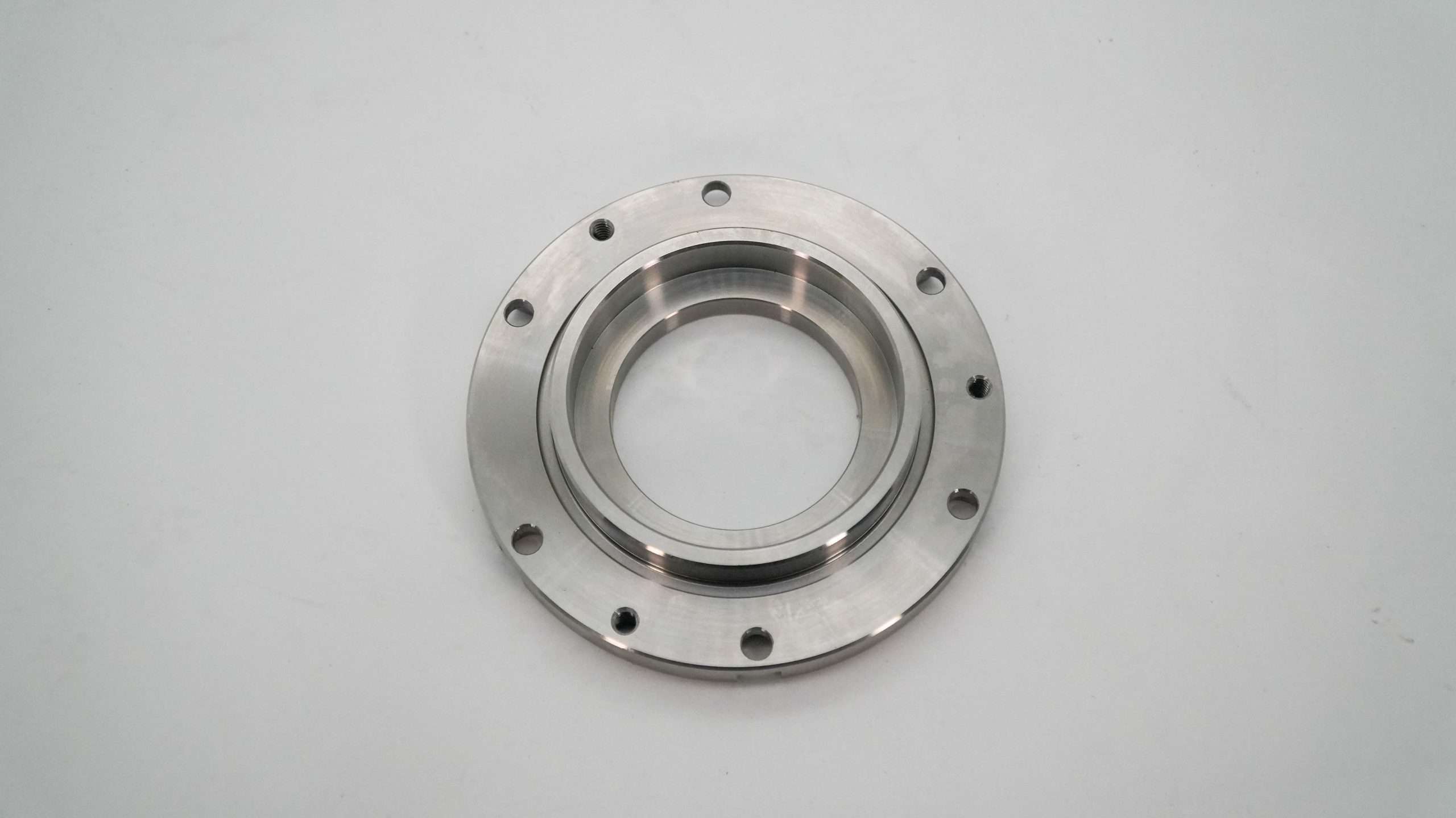 Circular machined flange