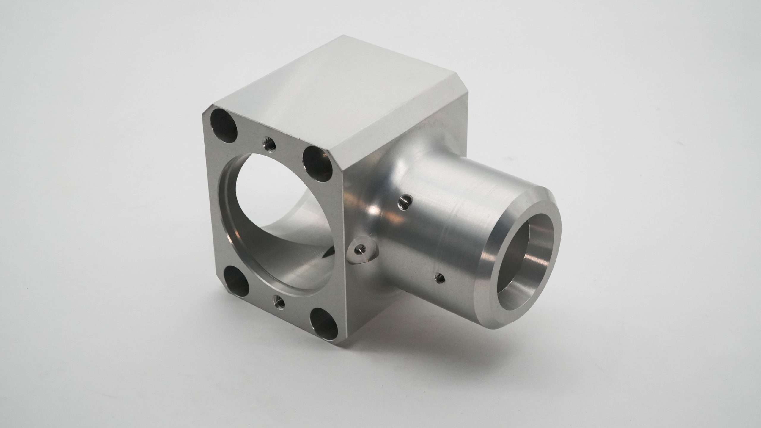 Combined milled and turned housing
