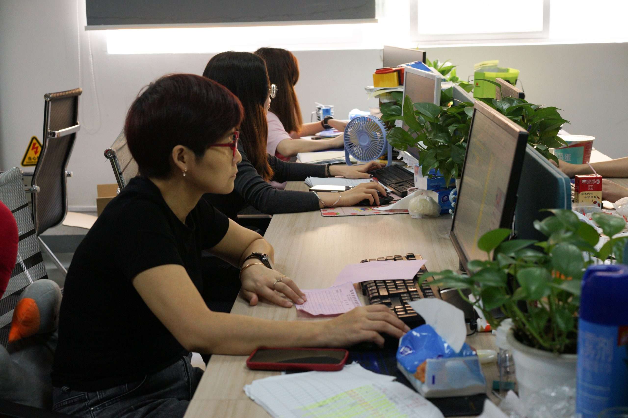Team member at an office workbench