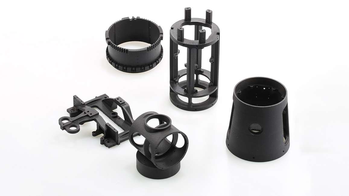 Group of black prototype parts