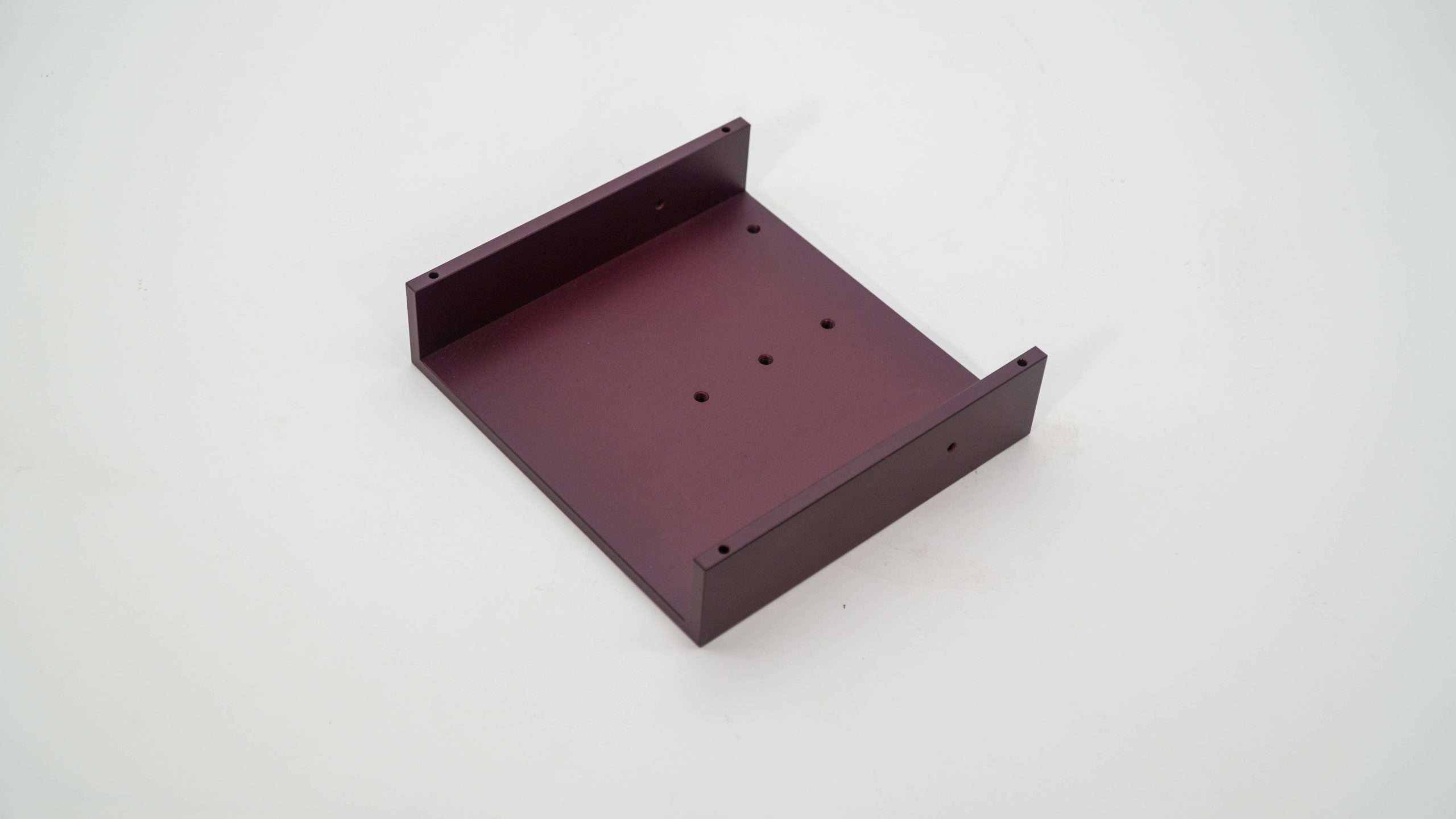 6061-T6 enclosure with 200-grit blasting and red hard anodizing